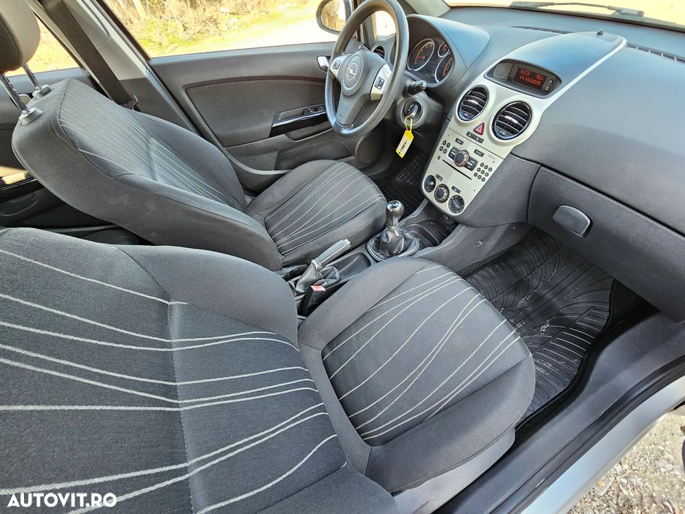 Opel Corsa 1.2i Cosmo - 12