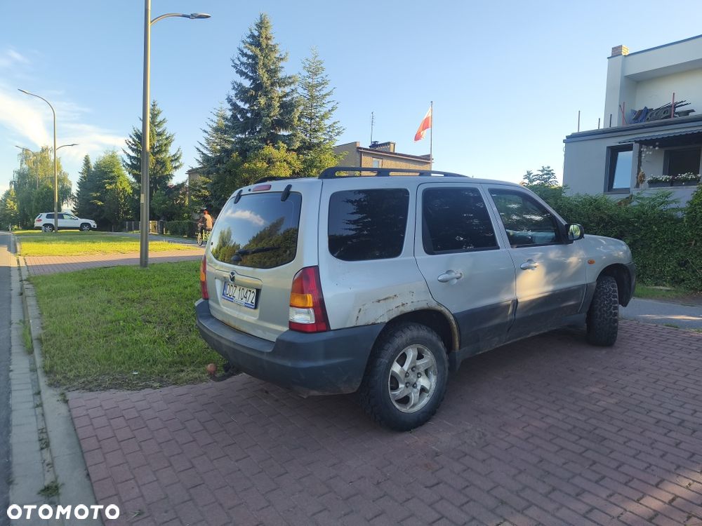 Mazda Tribute - 3