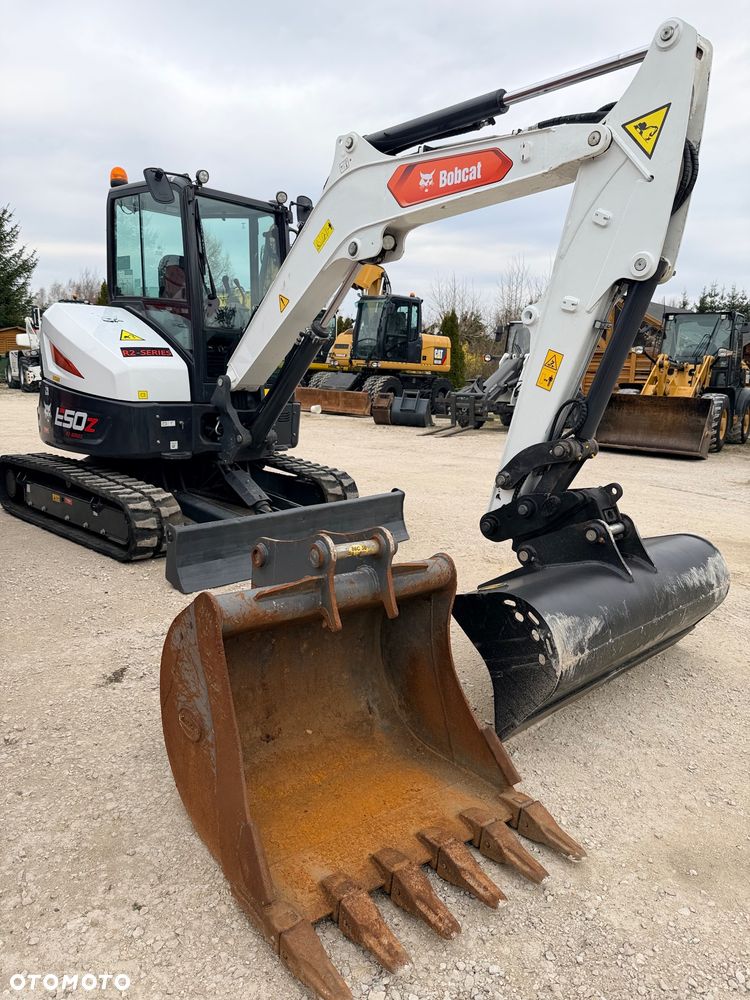 Bobcat Minikoparka Bobcat e50Z 5ton e55 e60 Cat 303.5 304  305 3xłyżki Ramię LOONG dodatkowe linie hydr wyjścia AUX1 + 2 przeciw waga MAX-dociążenie gąsienice 85% od nowości 1 właściciel z Niemiec Auto IDLEE po serwisie Widły wiertnica grabie i inne za dopłatą Szybkozłącze hydr Miller łyżka przedsiębierna Pług  Kubota Takeuchi Jcb - 7