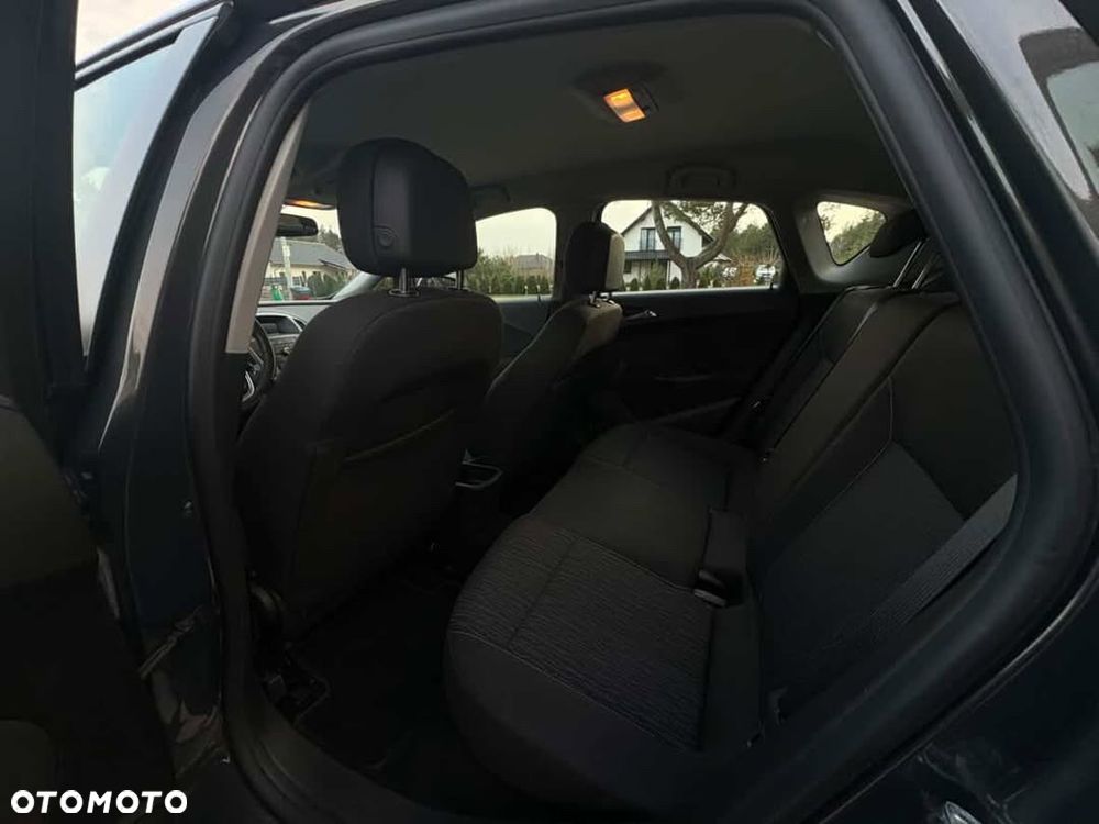 Opel Astra 1.6 Cosmo - 11