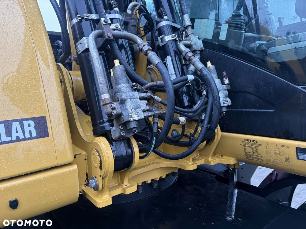 Caterpillar M 315D ROTOTILT SZCZYPCE PODPORY - 5
