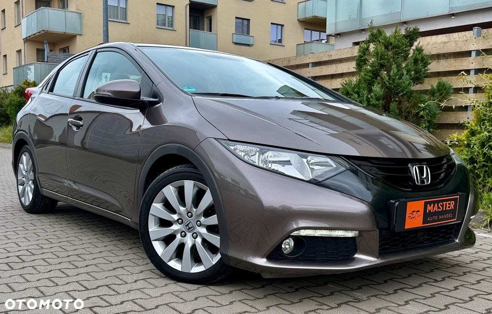 Honda Civic 1.4 i-VTEC Comfort - 1