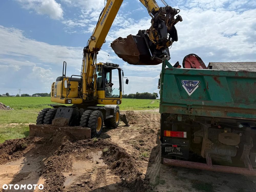 Komatsu Koparka kołowa Komatsu PW 148 Pług podpory Klima Centralne smarowanie Rototil Ramię 2 razy łamane PIĘKNA - 14
