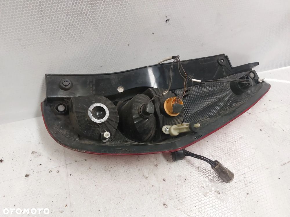 .  LAMPA TYL TYLNA LEWA SUZUKI SPLASH - 4