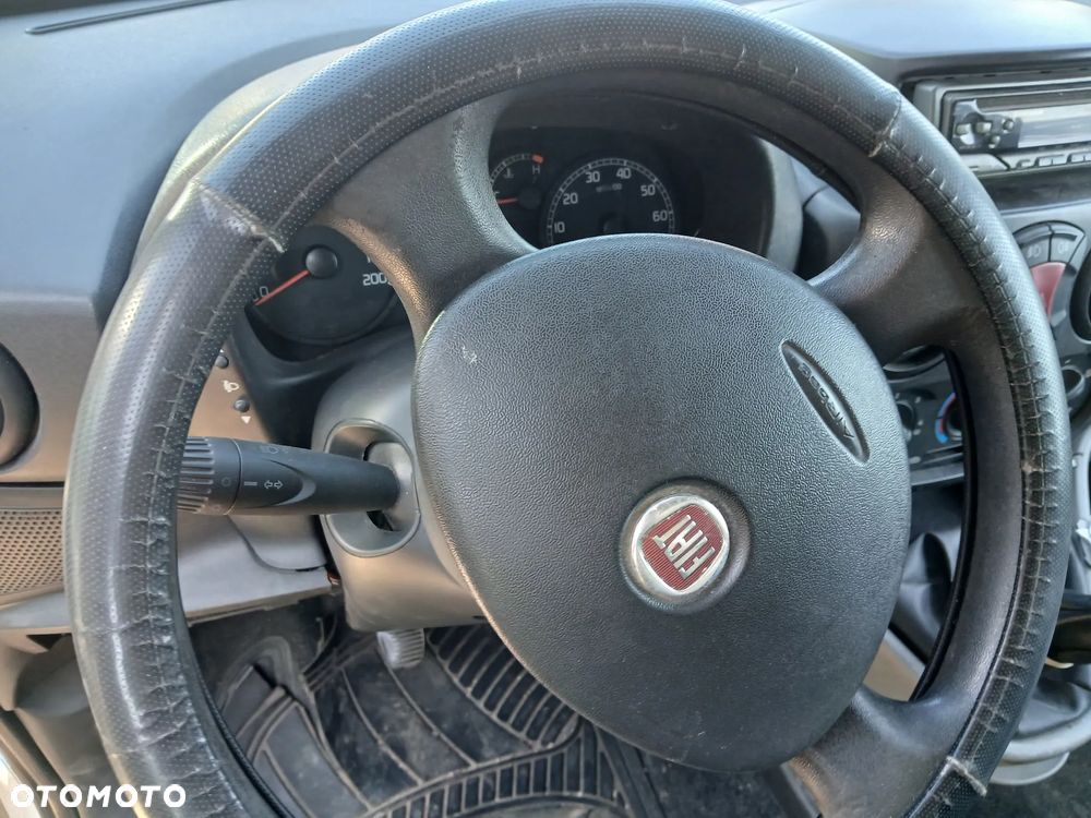 FIAT DOBLO II 2   fotel fotele kanapa deska kokpit podsufitka boczek boczki klamka podłokietnik licznik - 4