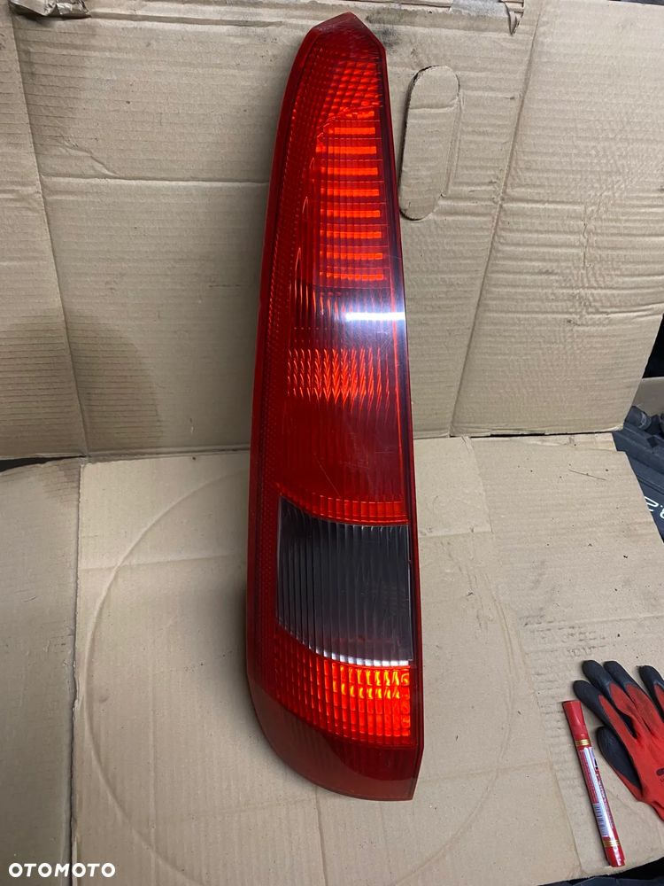 LAMPA TYLNA LEWA FORD FIESTA V 2S6113A603B - 1