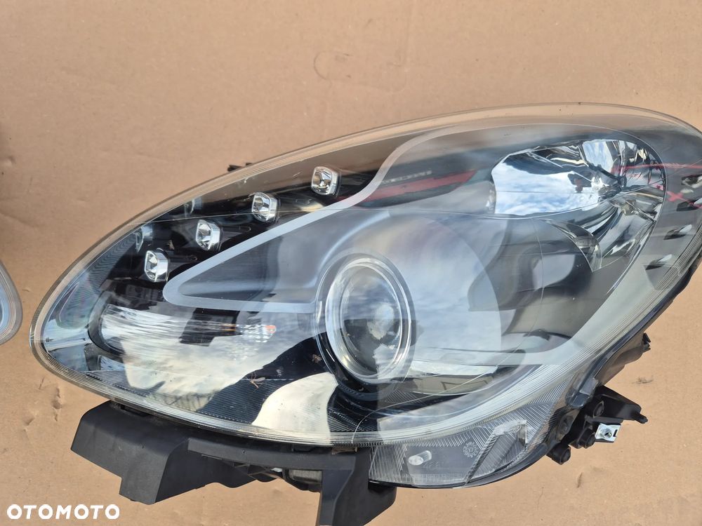 Alfa Romeo Giulietta .Komplet reflektorów.H7.Oryginały.Grafitowe. - 8