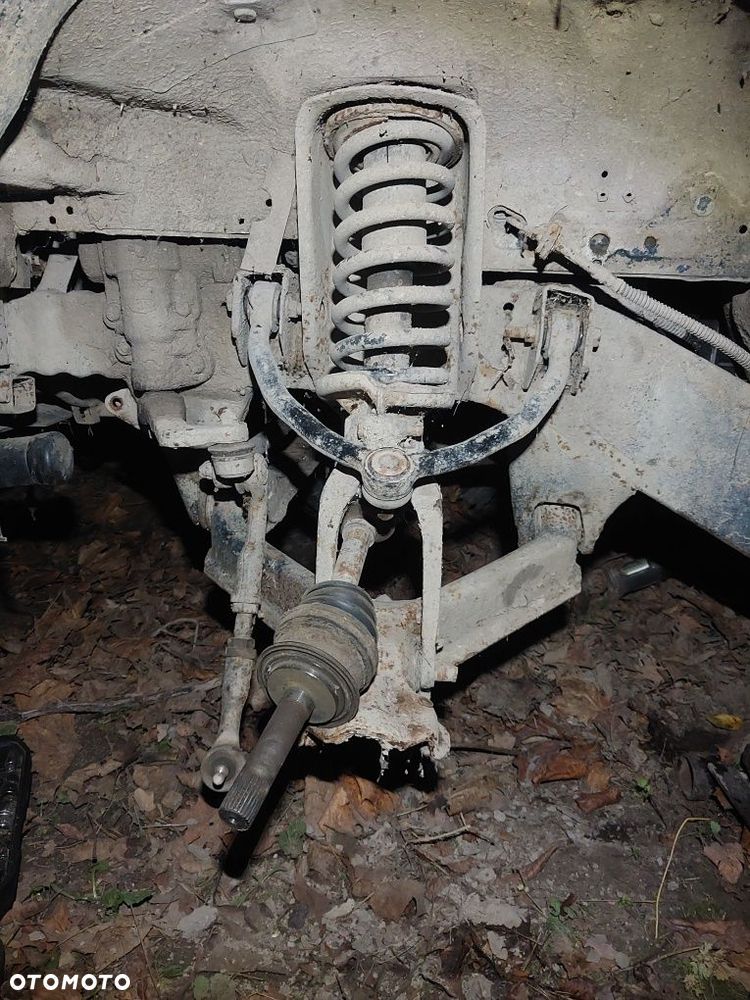 Amortyzator kompletny przód przedni kia sportage I 94-03r.