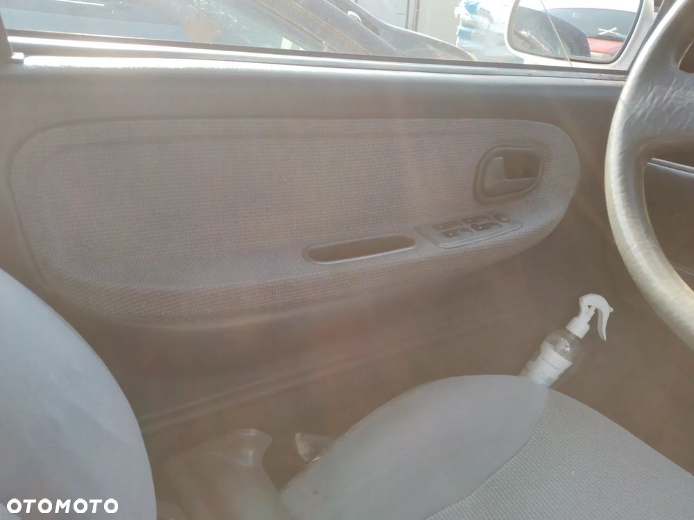 KIA SPORTAGE I 4X4 93-98 OSŁONA PRZECIWSŁONECZNA LEWA PRAWA (UC) - 29