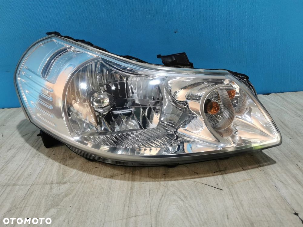 Suzuki SX4 Fiat Sedici lampa reflektor przód prawa Anglik - 1