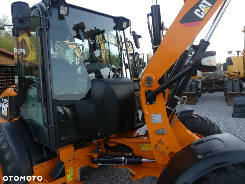 Caterpillar CAT 906H / Z Niemiec / 6424mtg / - 34