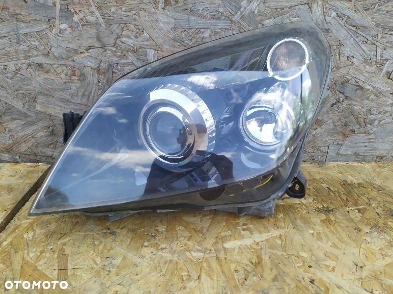 REFLEKTOR LEWY BIKSENON EU LAMPA LEWA PRZEDNIA PRZÓD OPEL ASTRA III H - 2