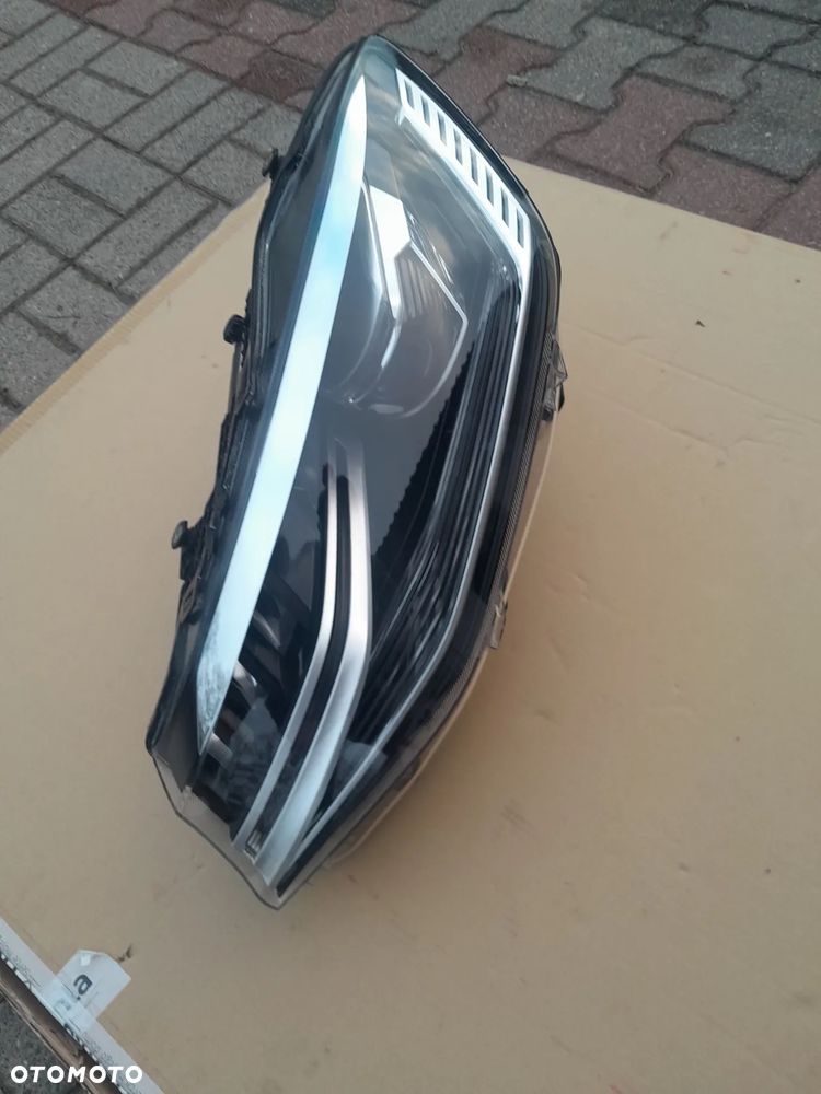 Vw Caddy 2K8941035C Lampa przód lewa - 2