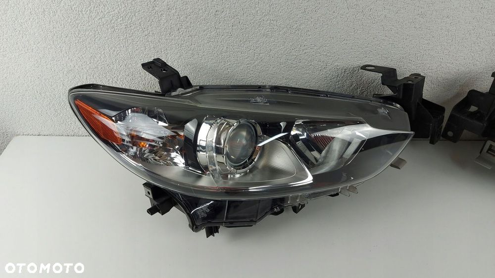 MAZDA 6 2012 13- REFLEKTOR LAMPA ZWYKŁA USA 275 - 3