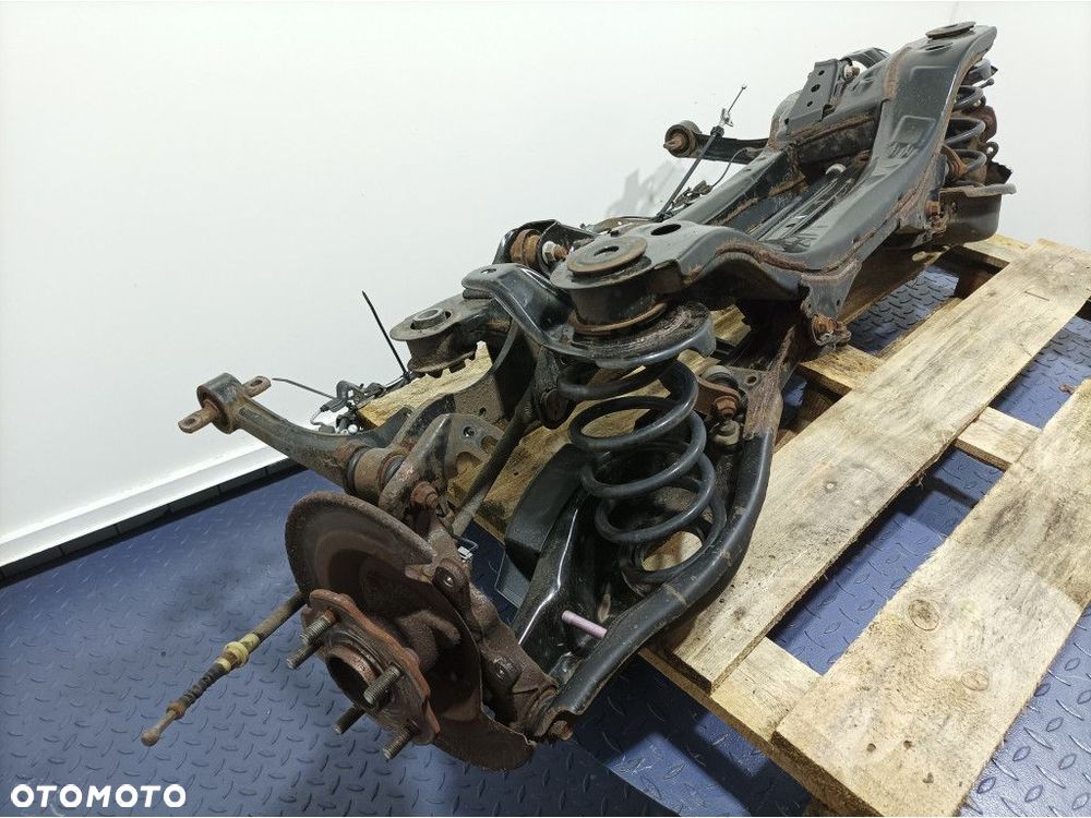 TOYOTA AURIS II LIFT KOMBI BELKA WÓZEK ZAWIESZENIA TYŁ - 3