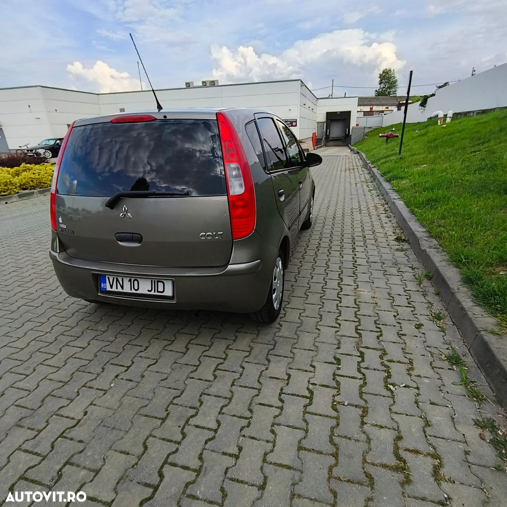 Mitsubishi Colt 1.1 Inform + - 4