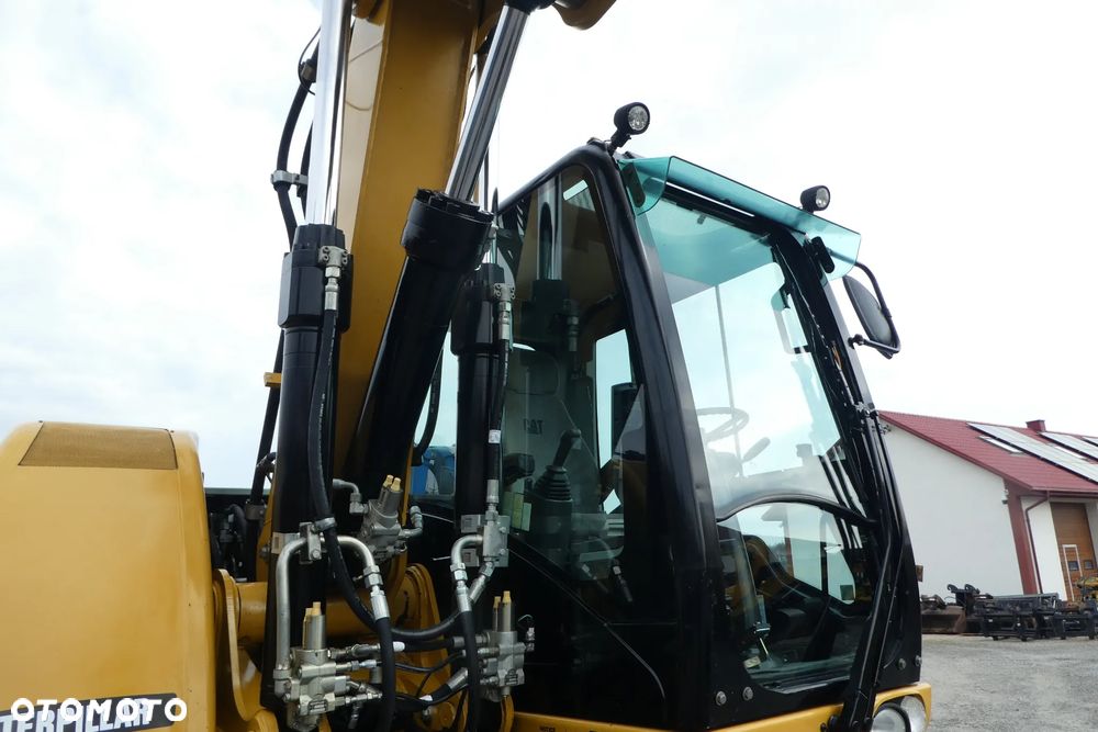 Caterpillar M 316D DWIE ŁYZKI - 16