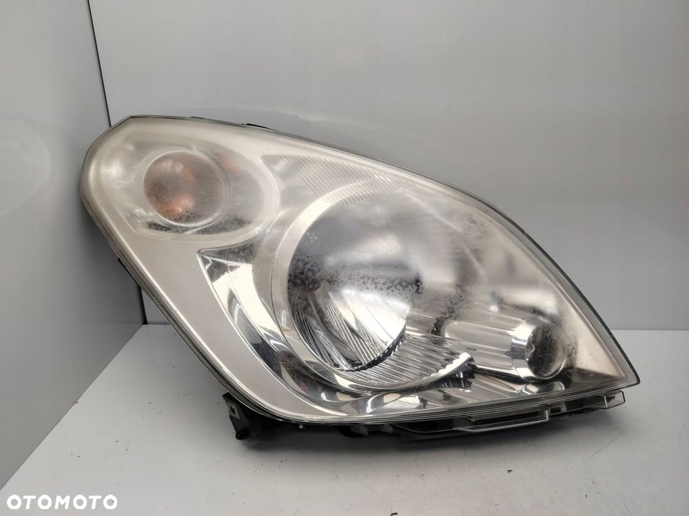 SUZUKI SPLASH 08R- REFLEKTOR LAMPA PRAWY PRZÓD PRAWA PRZEDNIA - 1