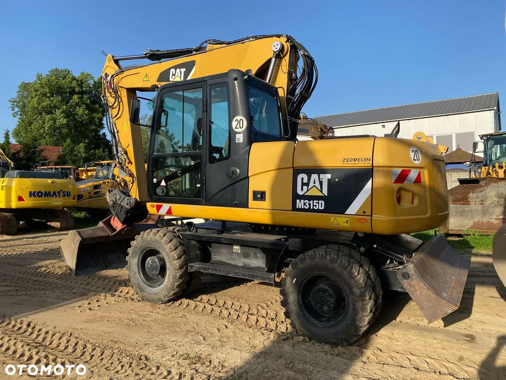 Caterpillar CAT M315D, 7000 MTH, 2014 ROK, Z NIEMIEC, SUPER STAN - 6