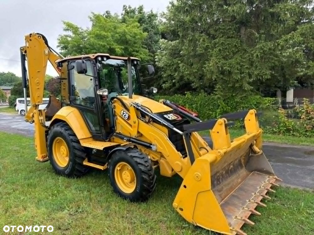Caterpillar 428 - 9