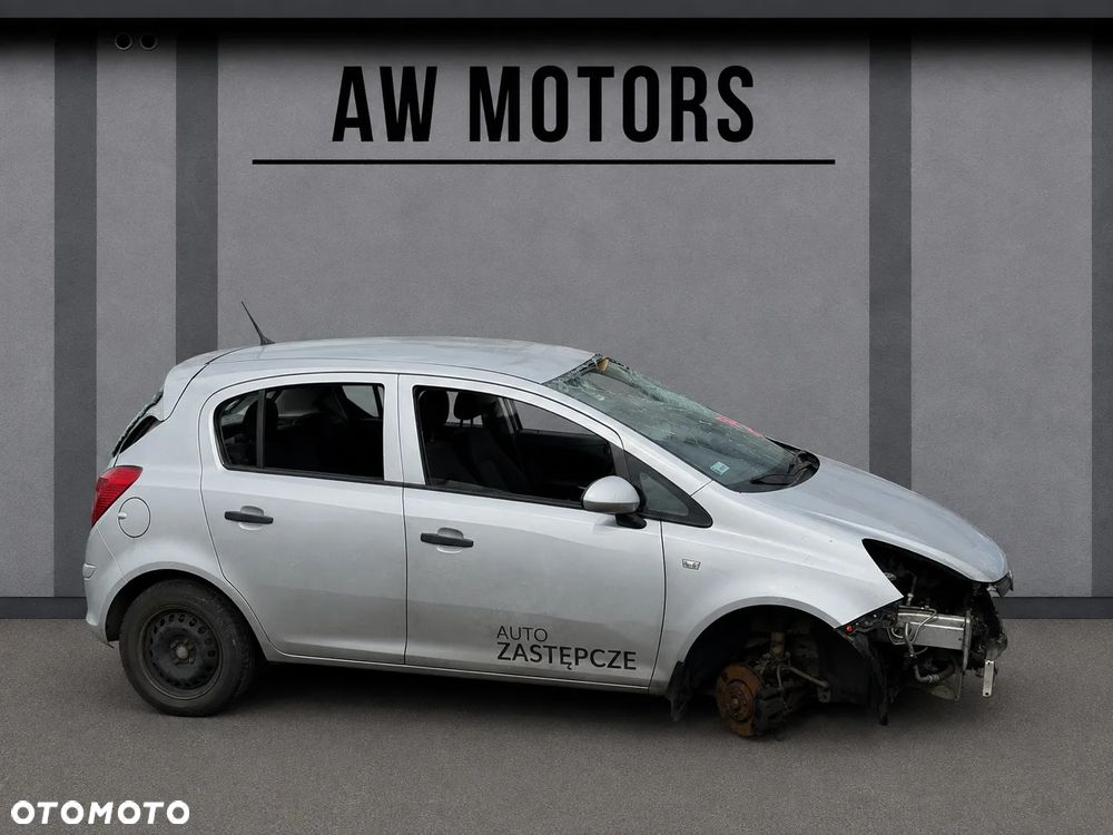 OPEL CORSA 2014 *SAMOCHÓD NA CZĘŚCI* 6854  MASKA, LAMPA, DRZWI, LUSTERKO, ZDERZAK, GRILL, BŁOTNIK, KLAPA, BELKA, DESKA, FOTELE, KANAPA, ĆWIARTKA KIEROWNICA, TARCZE, ZACISKI, ZAWIESZENIE, KOMPLETNY PRZÓD, KOMPLETNY TYŁ, LICZNIK, ZEGARY, PRAWE LEWE PRZÓD TYŁ - 4