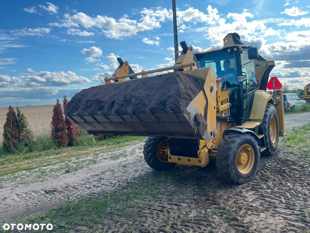 Caterpillar 428 - 4