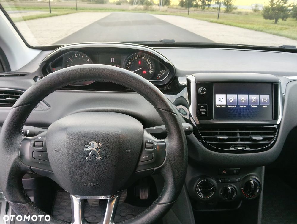 Peugeot 208 1.2 PureTech Style - 21