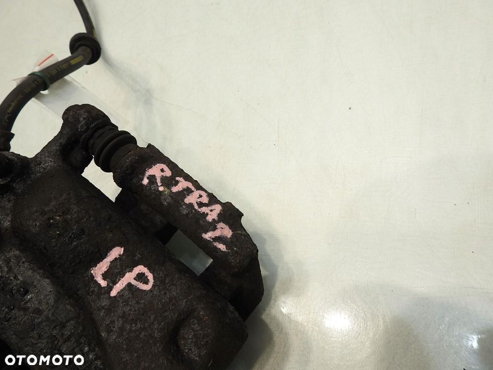 ZACISK HAMULCOWY LEWY PRZÓD RENAULT TRAFIC II 1.9 DCI - 2