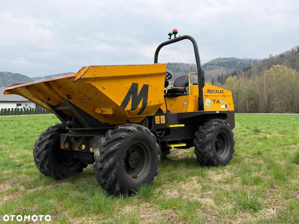 Terex Mecalac TA6s Wozidło wózek z Obrotową Kolebą. 6ton ładowność. 4x4. Silnik Perkins 80KM 4 cylindry. 1900 mtg. 2021 rok. Kamera z wielkim Ekranem! Jazda Rewers 3prędkości. Maszyna jak Nowa z Norweskiego Gospodarstwa! Ani deka luzów i wycieków! Hydrostatic. Pełny Oryginał. Hamulce brzytwa. Serwisy w DEKRA. Maszyna Woziła lekkie ładunki. Praktycznie zerowe zużycie. Wielka Okazja. Wszystko w pełnym Oryginale. Opony Oryginał wszystkie z 2020roku. - 30