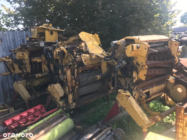 Częsci parts dosieczkarni polowej New Holland FX375 FX450 FX38 FX40 CornCraker