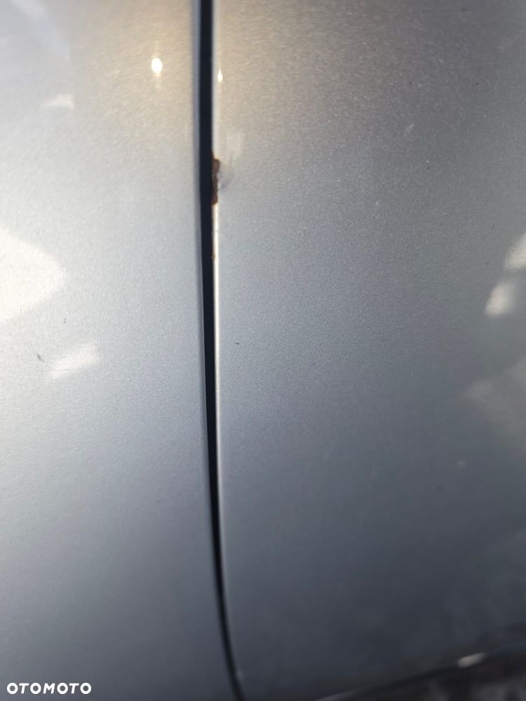 Drzwi lewy  przód  vw  Passat  b7  w  kolorze  LA7W - 2