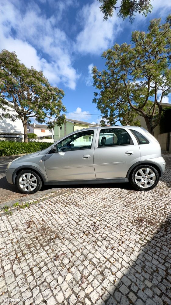 Opel Corsa 1.2 Twinport Enjoy - 8