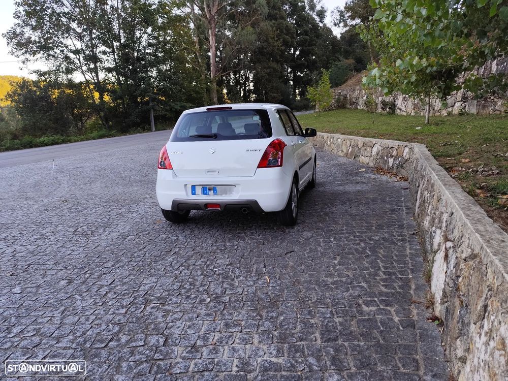 Suzuki Swift 1.3 DDiS Quiksilver - 4