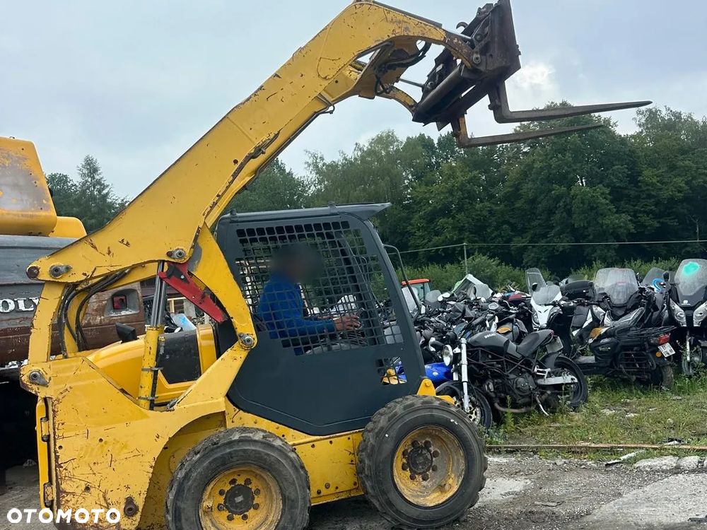 Komatsu Miniładowarka Ładowarka Kompaktowa KOMATSU SK 4x4 - 1