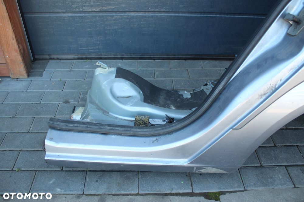 ĆWIARTKA BŁOTNIK LEWY TYLNY OPEL ASTRA H KOMBI Z163 - 5