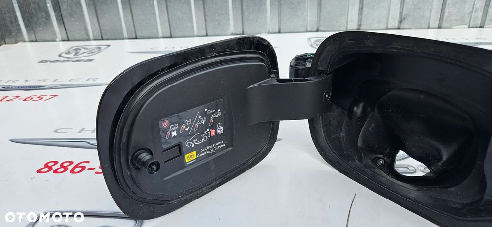RAM 1500 V 5 2019- Klapka wlewu paliwa P68347151AC  KOLOR PXJ - 10