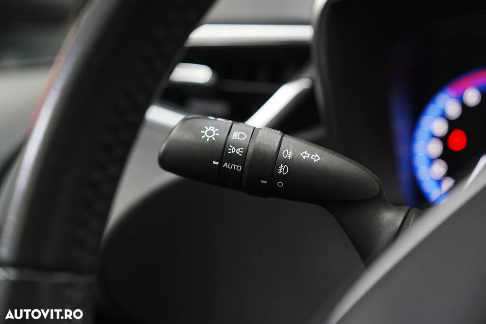 Toyota Corolla 1.8 HSD Exclusive - 26