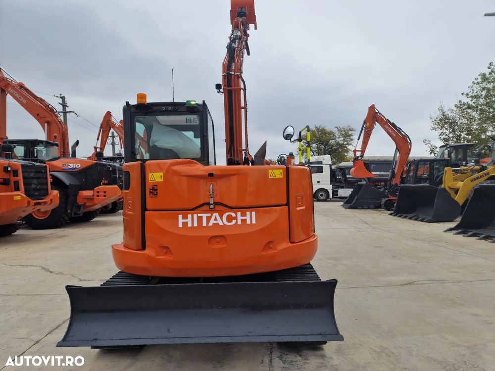 Hitachi ZX85-6, 2022, 2.582h, Masa Operationala 8,65t, CUPLA RAPIDA HIDRAULICA+3 CUPE NOI, SENILE NOI, Inst picon, camera spate, ad sapare 5m, ridica 4,5t, LAMA NIVELARE, Sistem antifurt, 58CP, Leasing 4 ani cu rata lunara 1300Eur/6500 lei,PROMOTIE 58.900eur - 39