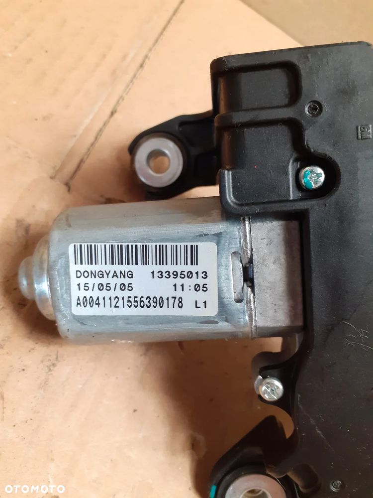 } SILNICZEK WYCIERACZEK 13395013 OPEL ASTRA J - 2