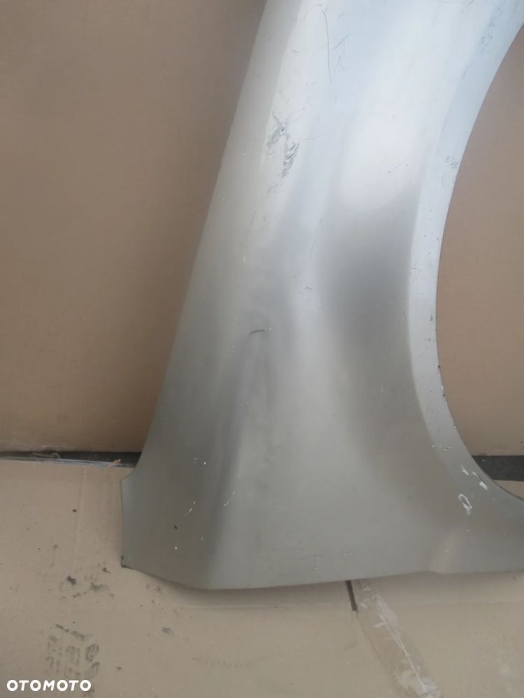 błotnik prawy VW Passat B5 FL Orginał bez rdzy - 4