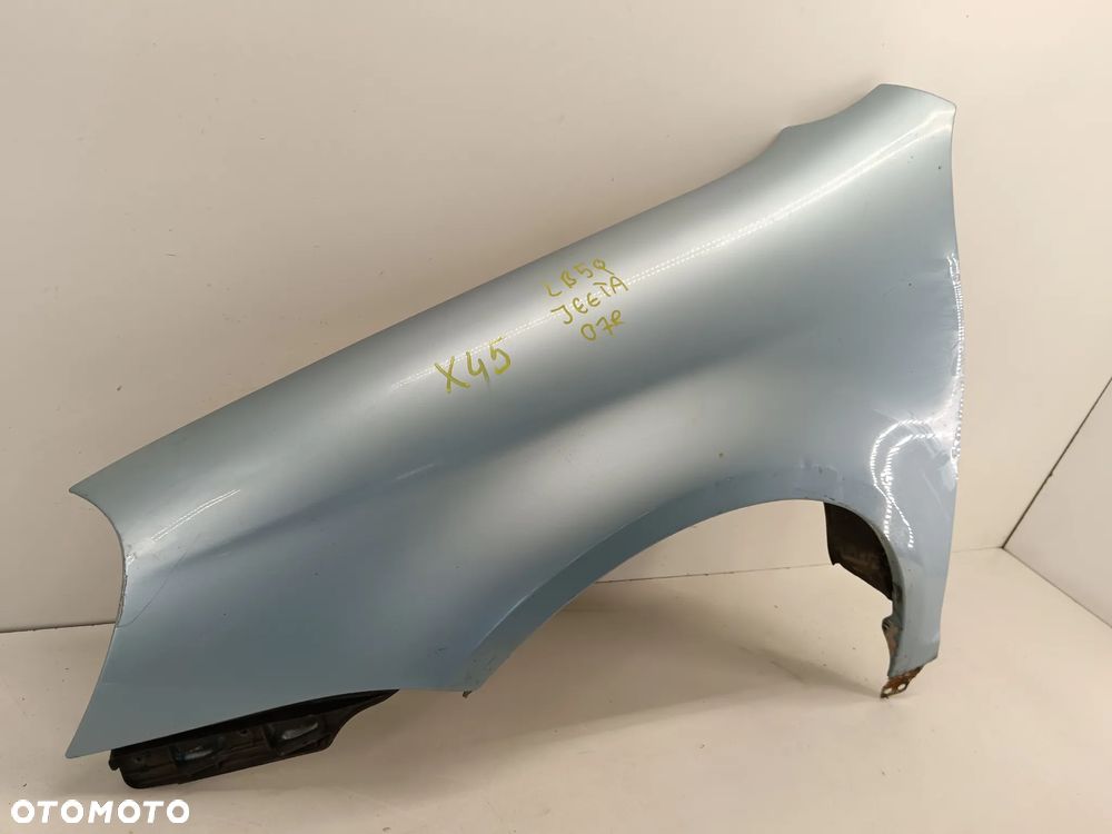 BŁOTNIK LEWY PRZÓD PRZEDNI VW JETTA 05-10 LB5Q - 2