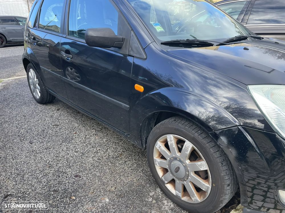 Ford Fiesta 1.25 Ghia - 19