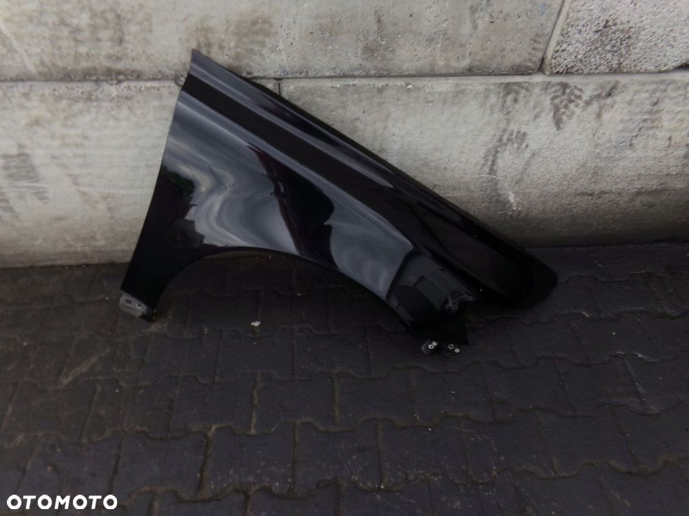 BŁOTNIK PRAWY PRZÓD PRZEDNI VOLVO V50