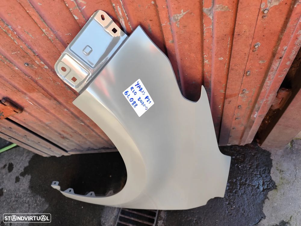 TOYOTA YARIS P21 GUARDA LAMAS ESQUERDO - GL088 - 2
