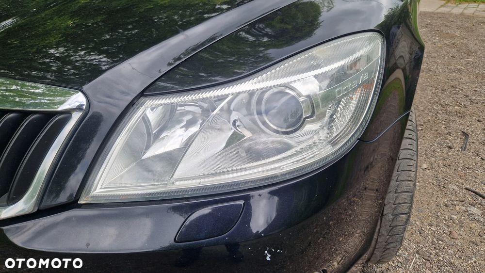 SKODA OCTAVIA II LIFT LAMPA XENON SKRĘTNY PRZÓD LEWA - 1