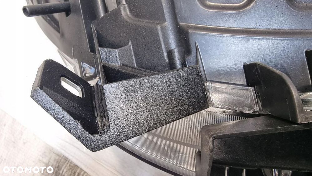 Opel Combo D lampa lewa przód przednia 520868580E - 11