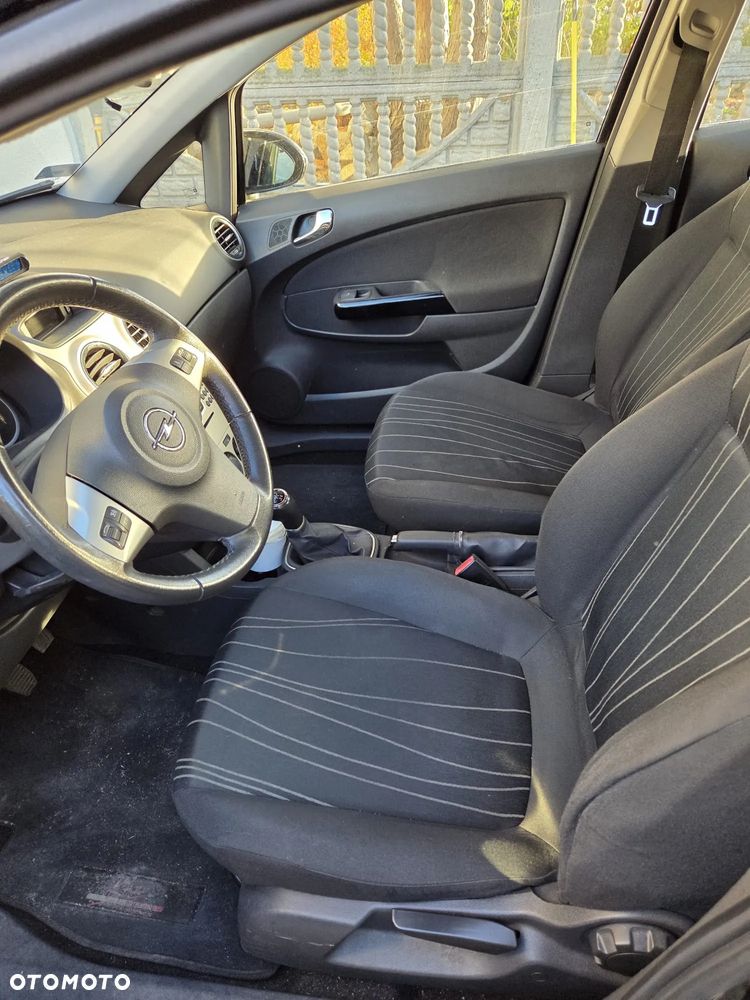 Opel Corsa 1.2 16V Enjoy - 12