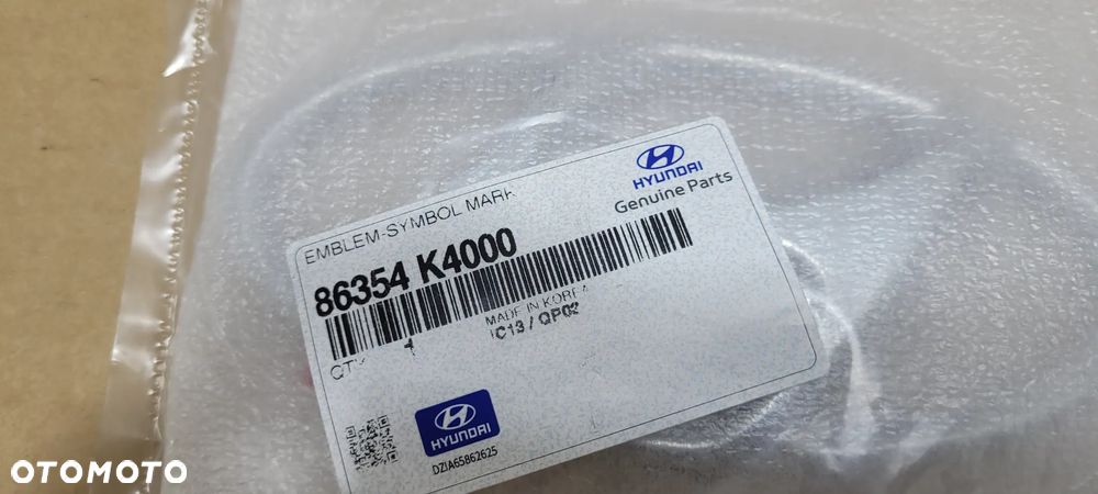 EMBLEMAT ZNACZEK LOGO HYUNDAI KONA EV 86354-K4000 - 2