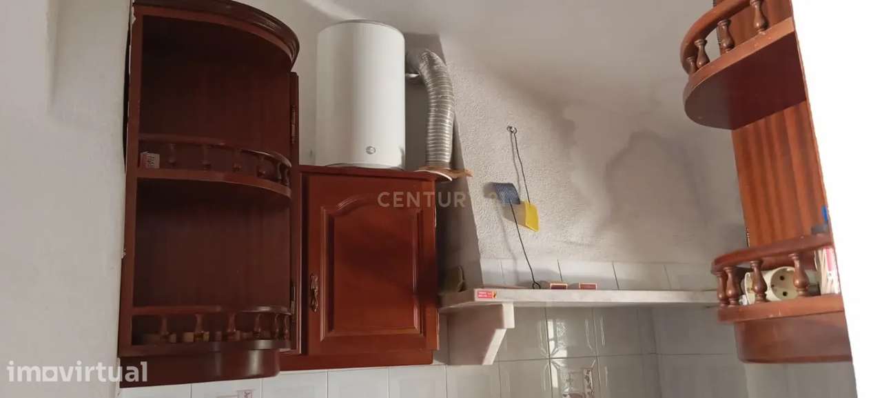 Moradia Térrea com logradouro no centro da Costa da Caparica - Grande imagem: 4/21