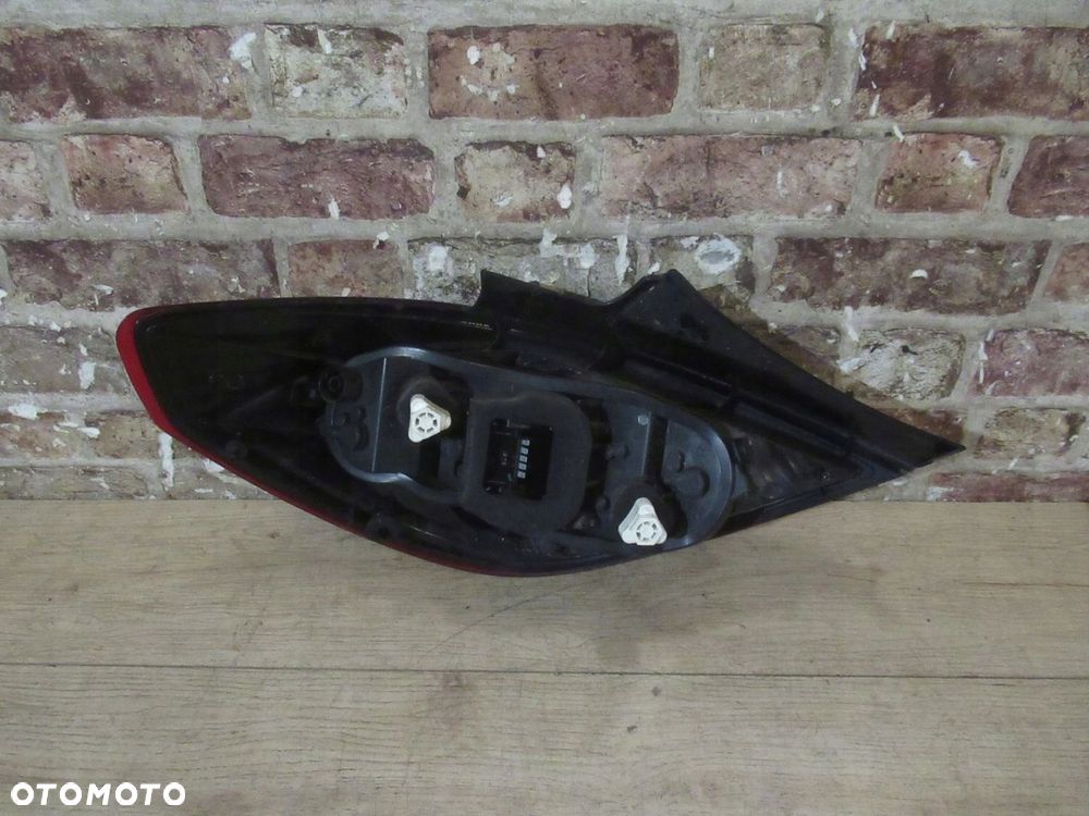 LAMPA TYŁ PRAWA OPEL CORSA D 06- ROK 3 DRZWI - 4